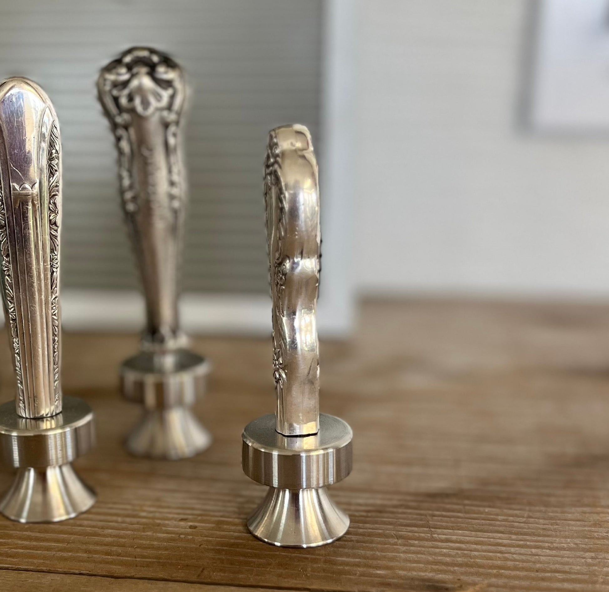 Side view detail of William Rogers Grand Elegance pattern knife bottle opener with ornate floral handle - handcrafted upcycled vintage silverware accessory - Laughing Frog Studio