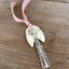 Minerva artisan angel ornament with spoon handle body and spoon bowl wings with red striped ribbon hanger - handcrafted upcycled vintage silverware ornament - Laughing Frog Studio