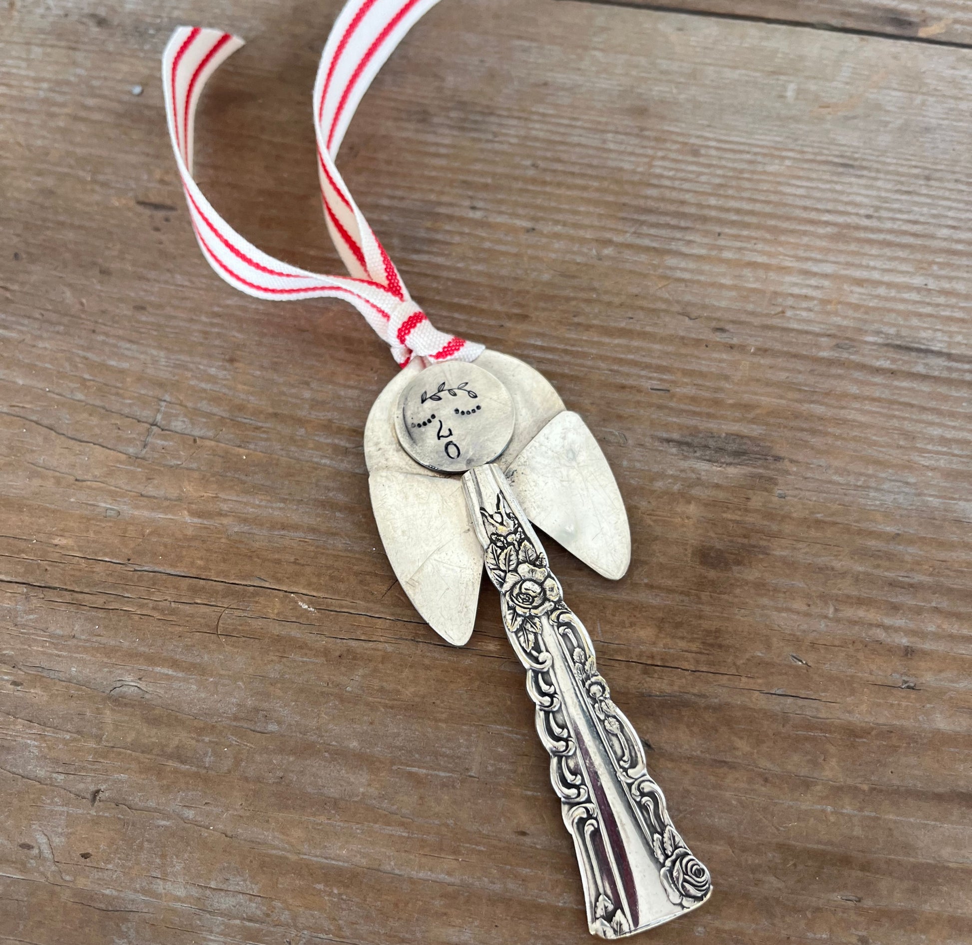 Minerva artisan angel ornament with spoon handle body and spoon bowl wings with red striped ribbon hanger - handcrafted upcycled vintage silverware ornament - Laughing Frog Studio