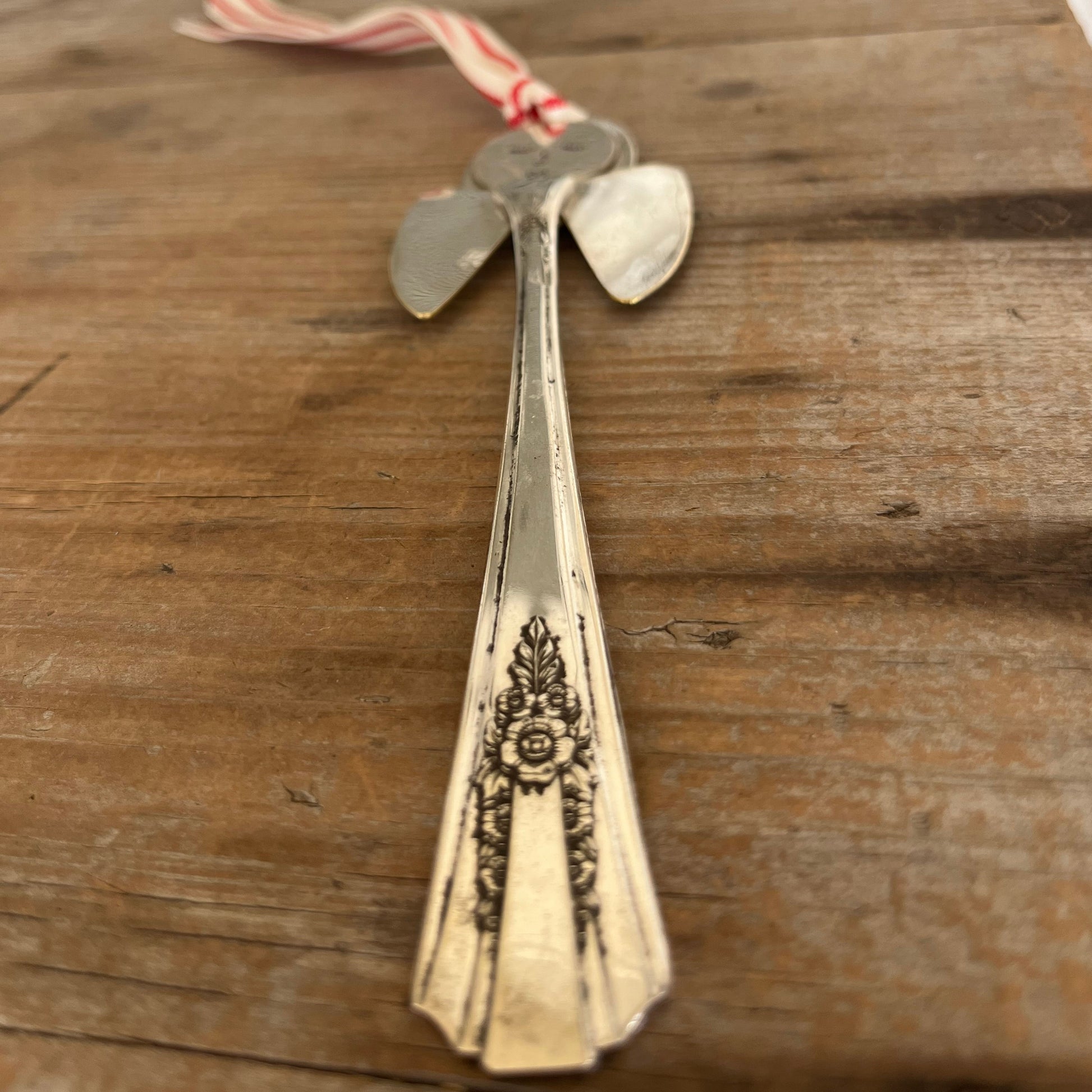Alternate view of Frances artisan angel ornament with spoon handle body and spoon bowl wings with red striped ribbon hanger - handcrafted upcycled vintage silverware ornament - Laughing Frog Studio