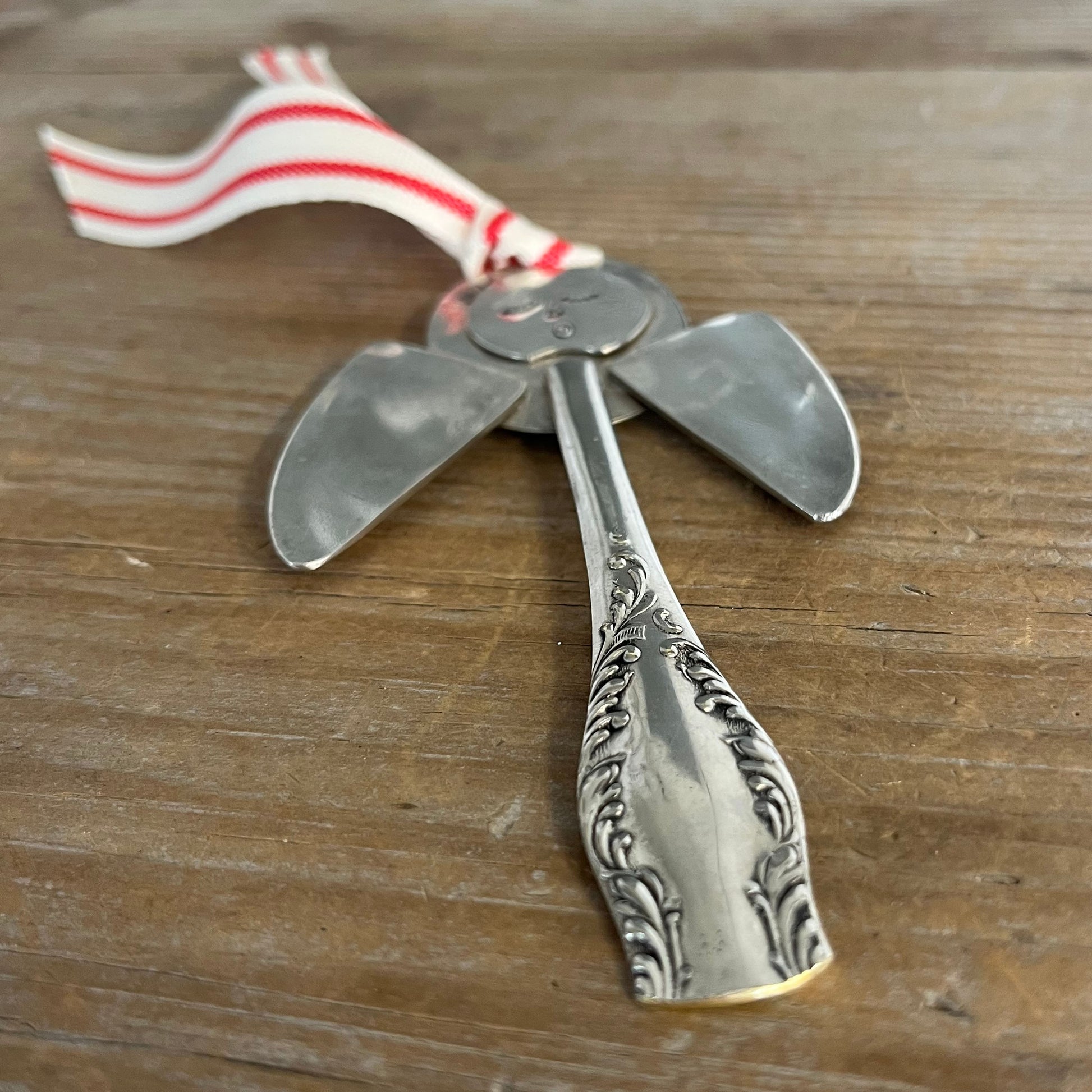 Alternaet view of Pearl artisan angel ornament with spoon handle body and spoon bowl wings with red striped ribbon hanger - handcrafted upcycled vintage silverware ornament - Laughing Frog Studio