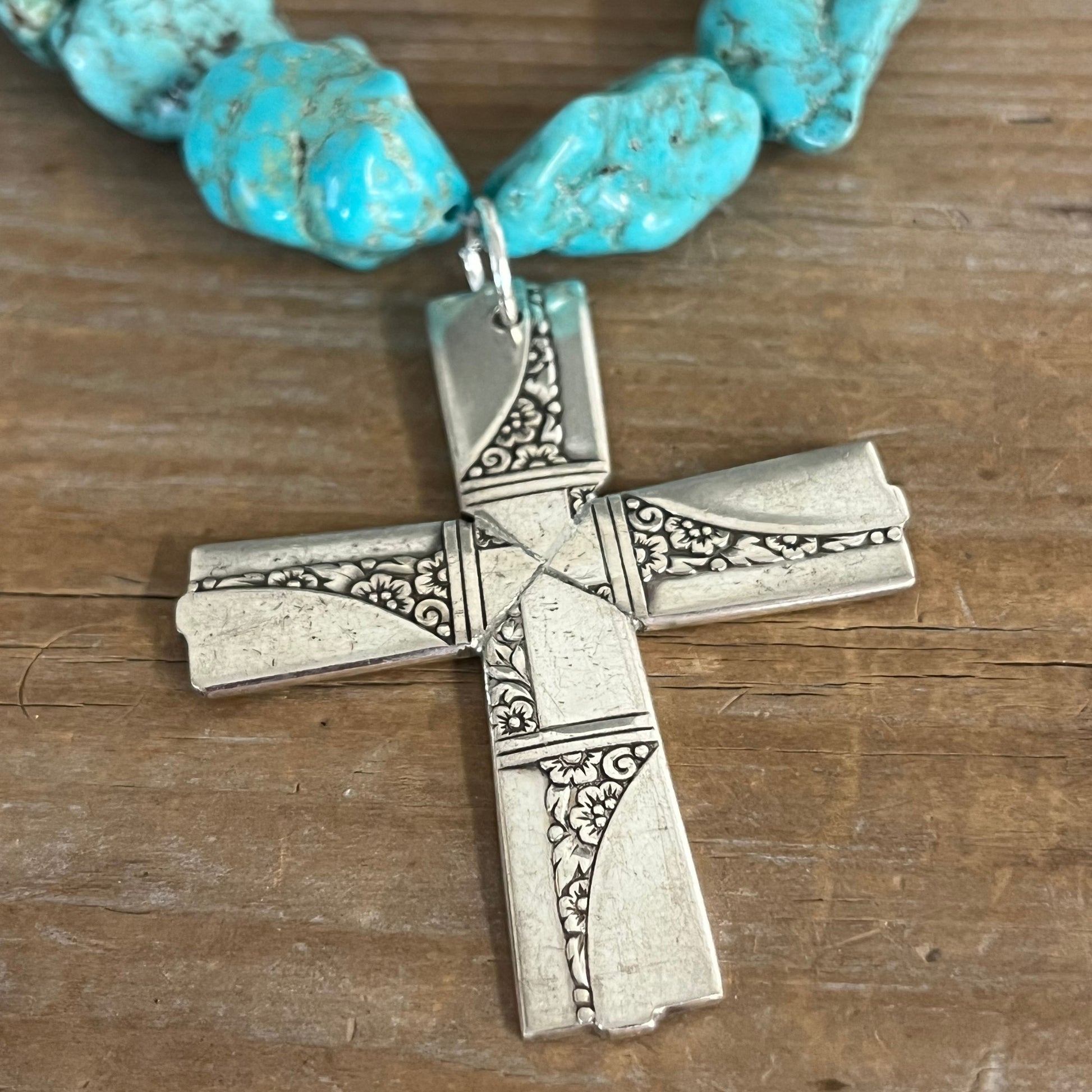 Detail view of Nobility Plate Caprice pattern spoon cross pendant on chunky turquoise howlite choker - handcrafted upcycled vintage silverware jewelry - Laughing Frog Studio pattern