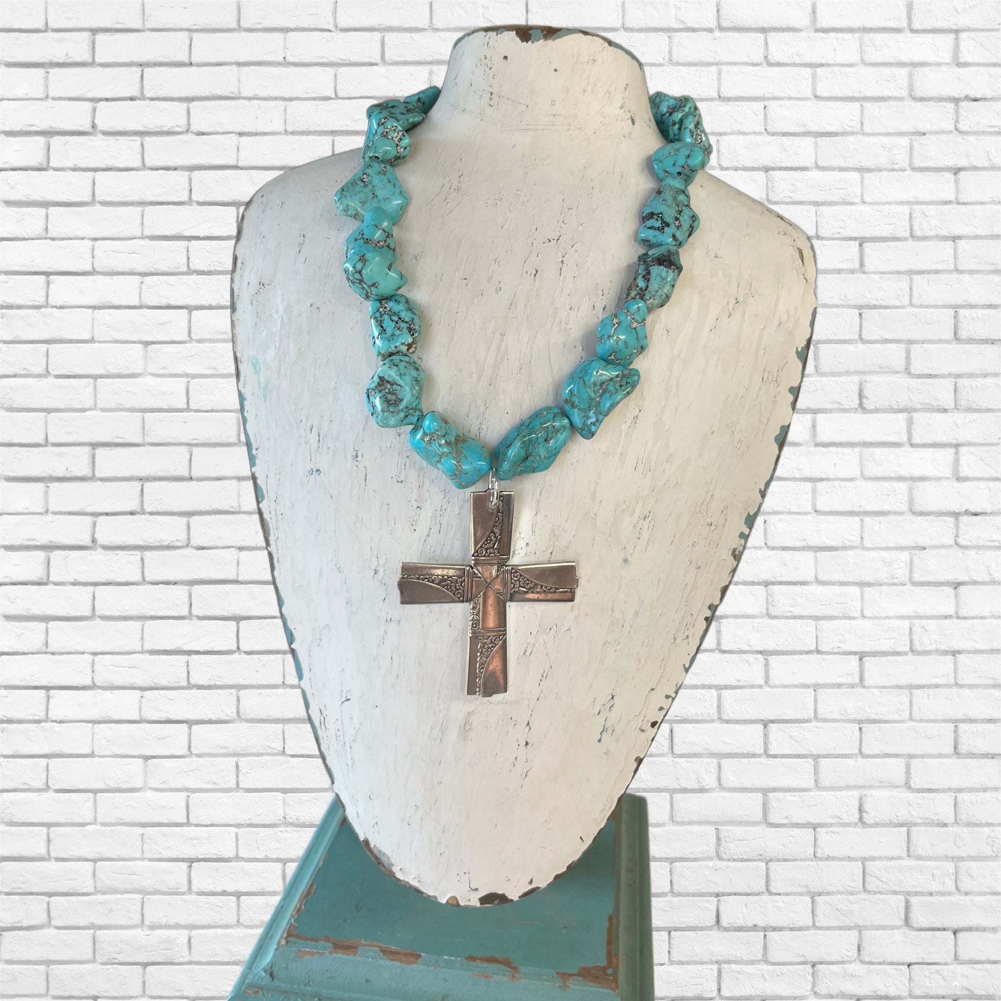 Nobility Plate Caprice pattern spoon cross pendant on chunky turquoise howlite choker shown on display bust - handcrafted upcycled vintage silverware jewelry - Laughing Frog Studio pattern