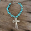 Handcrafted Fortune spoon cross pendant on chunky turquoise howlite choker necklace - premium artisan upcycled silverware jewelry