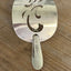 Detail view of Side view cake server hair barrette with cut-out scroll design with Oneida Meadowbrook stick - handcrafted upcycled vintage silverware hair accessory - Laughing Frog Studio