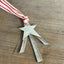 Scrap silverware Christmas tree shaped ornament with a star and red striped ribbon hanger - handcrafted upcycled vintage silverware ornament - Laughing Frog Studio