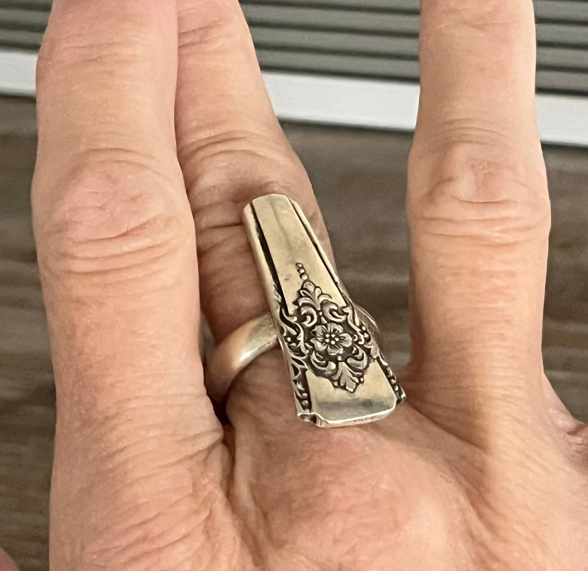 Vintage silverware jewelry - Mountain Rose statement ring with handcrafted detail and patina shown on a hand for size and scale
