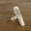 Close-up of Mountain Rose pattern detail on upcycled vintage silverware statement ring
