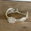 Front view of Reflection spoon link bracelet with rhinestone button center - handcrafted from upcycled vintage silverware - Laughing Frog Studio