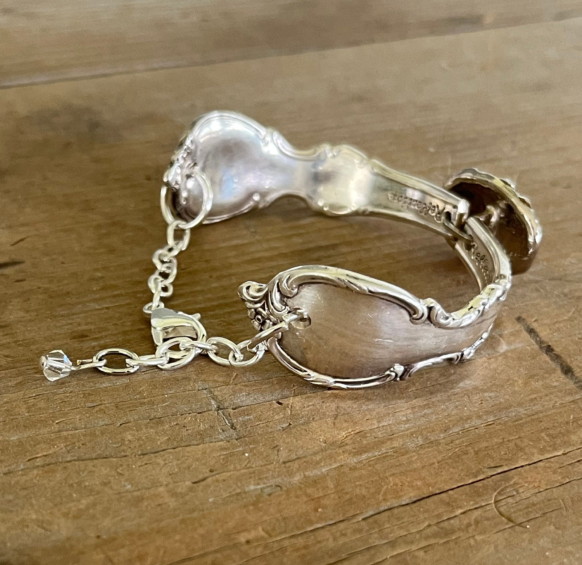 Detail view of chain on Reflection spoon link bracelet with rhinestone button center - handcrafted from upcycled vintage silverware - Laughing Frog Studio