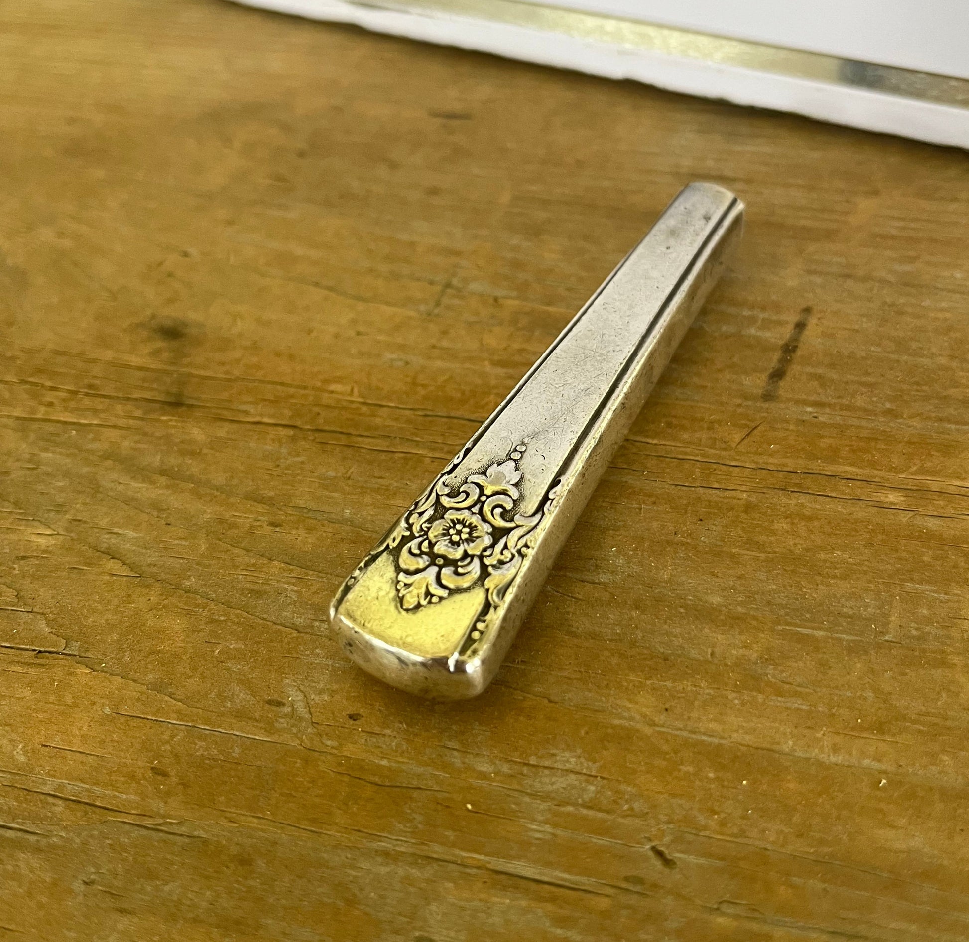 Deail view of magnet mount Mountain Rose silver-plate knife handle bud vase - handcrafted from upcycled vintage silverware - Laughing Frog Studio