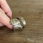 Side profile of Tony the Tiger coil-wrap ring showing twisted silverplate band - Spoon Ring - handcrafted from upcycled vintage silverware - Laughing Frog Studio