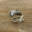 Angled view of Tony the Tiger coil-wrap ring showing vintage spoon artwork and patina - Spoon Ring - handcrafted from upcycled vintage silverware - Laughing Frog Studio