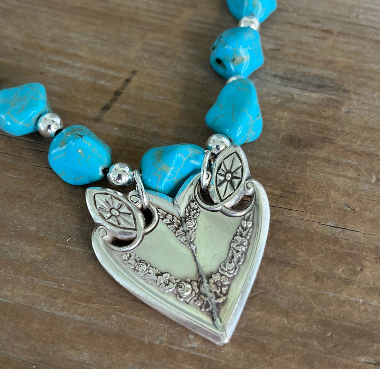 Lacy heart pendant choker necklace handcrafted from 1847 Rogers Brothers Old Colony vintage silverware closeup of pendant - Laughing Frog Studio