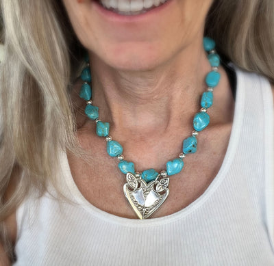 Lacy heart pendant choker necklace handcrafted from 1847 Rogers Brothers Old Colony vintage silverware shown on model - Laughing Frog Studio 