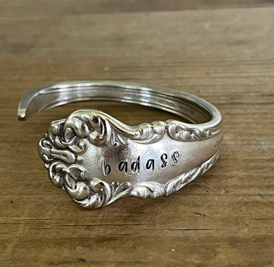 close up of COMMUNITY AVALON hand-stamped BADASS spoon cuff bracelet - handcrafted from upcycled vintage silverware - Laughing Frog Studio