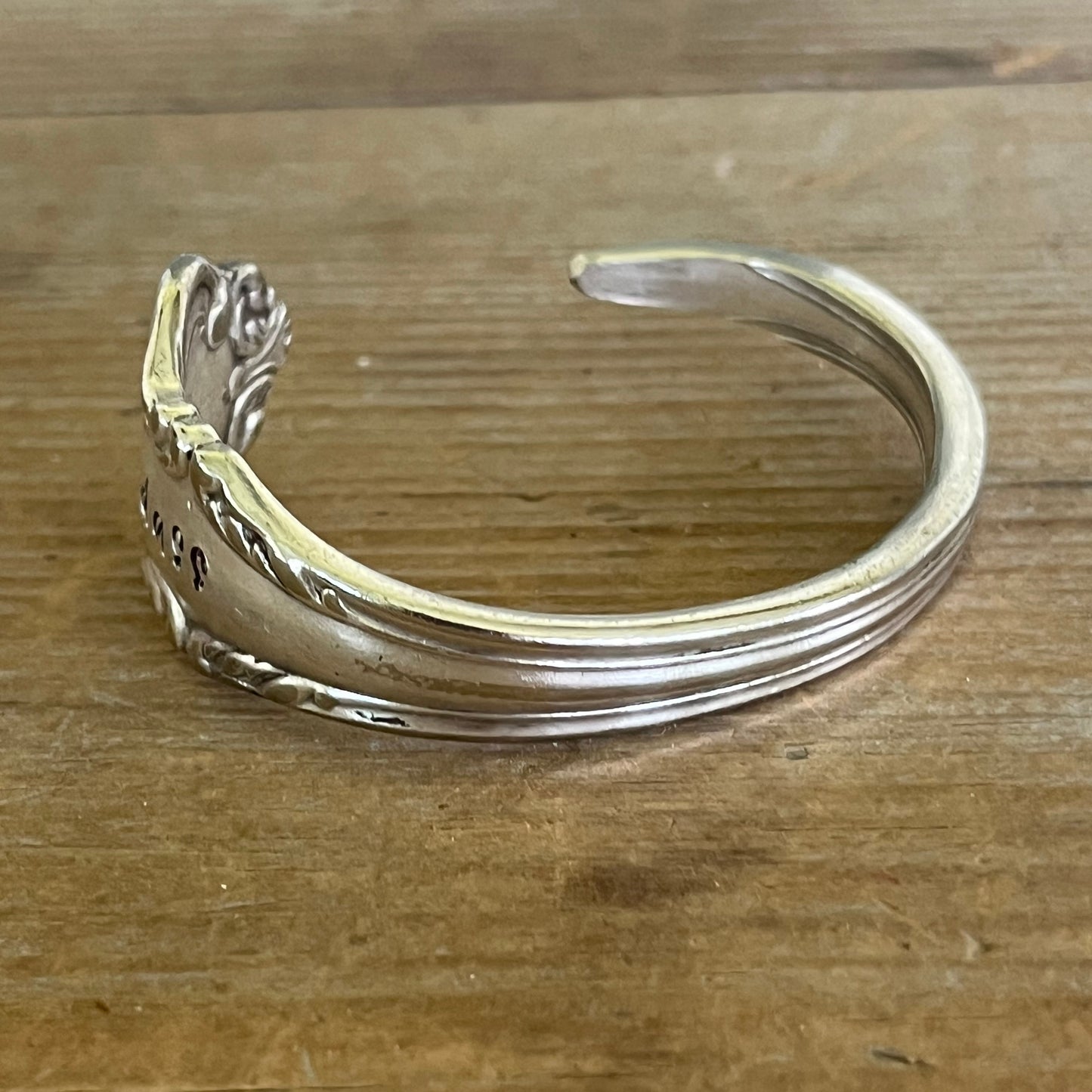 back view of COMMUNITY AVALON hand-stamped BADASS spoon cuff bracelet - handcrafted from upcycled vintage silverware - Laughing Frog Studio