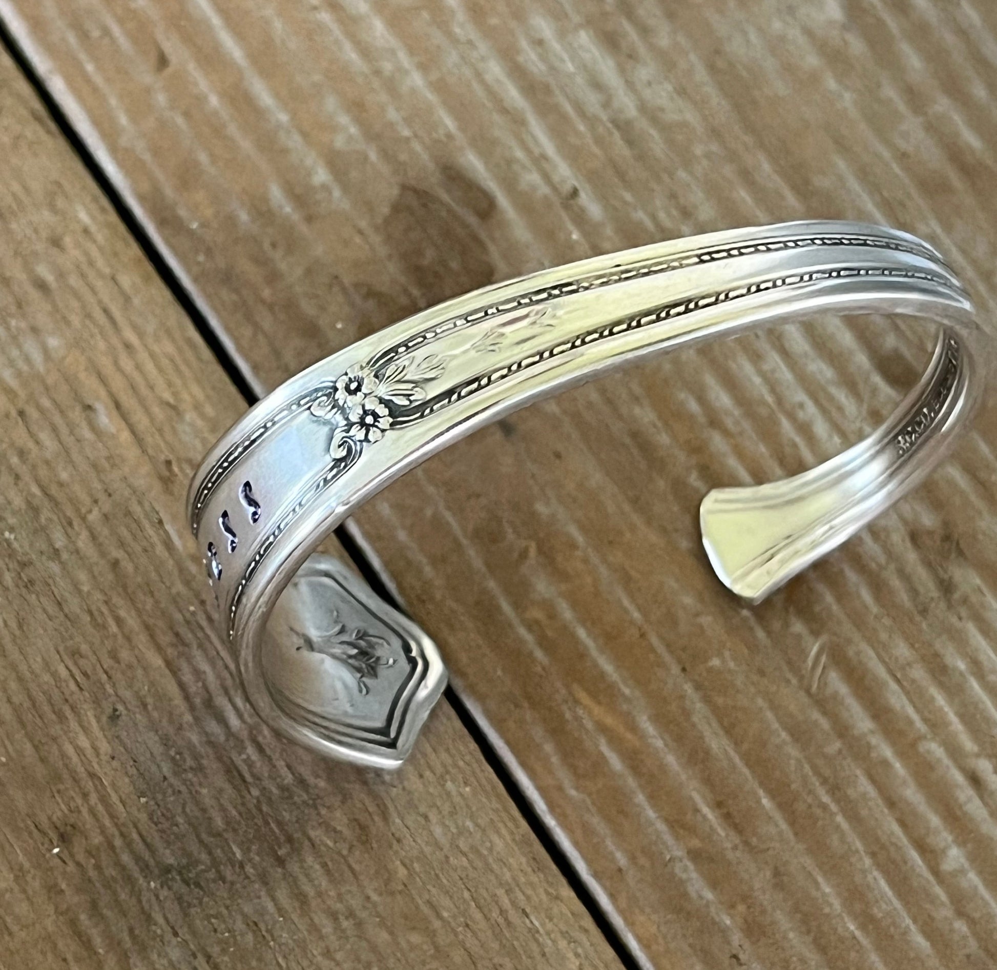 Detailed top view of R.C. Co BOUQUET / VENDOME hand-stamped BADASS spoon cuff bracelet - handcrafted from upcycled vintage silverware - Laughing Frog Studio