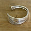 Top view of QUEEN BESS hand-stamped BADASS spoon cuff bracelet - handcrafted from upcycled vintage silverware - Laughing Frog Studio