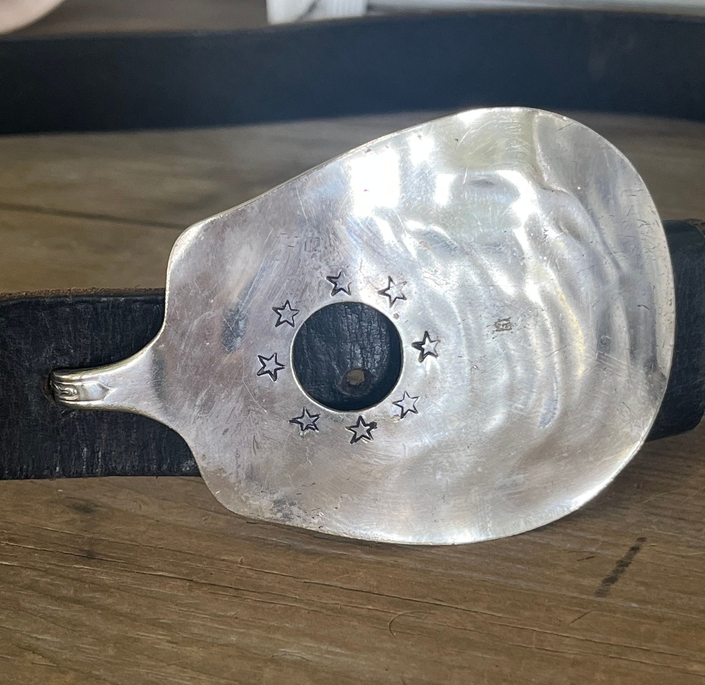 Hand-stamped stars pattern guitar spoon belt buckle shown on snap belt  - handcrafted from upcycled vintage silverware - Laughing Frog Studio