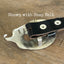 Hand-stamped stars pattern guitar spoon belt buckle, back view showing catch and prong on snap belt - handcrafted from upcycled vintage silverware - Laughing Frog Studio 