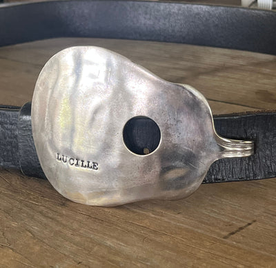 Lucille guitar spoon belt buckle shown on a leather belt - handcrafted from upcycled vintage silverware - Laughing Frog Studio