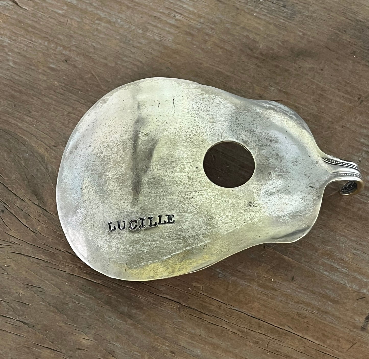 Lucille guitar spoon belt buckle, close up of patina - handcrafted from upcycled vintage silverware - Laughing Frog Studio