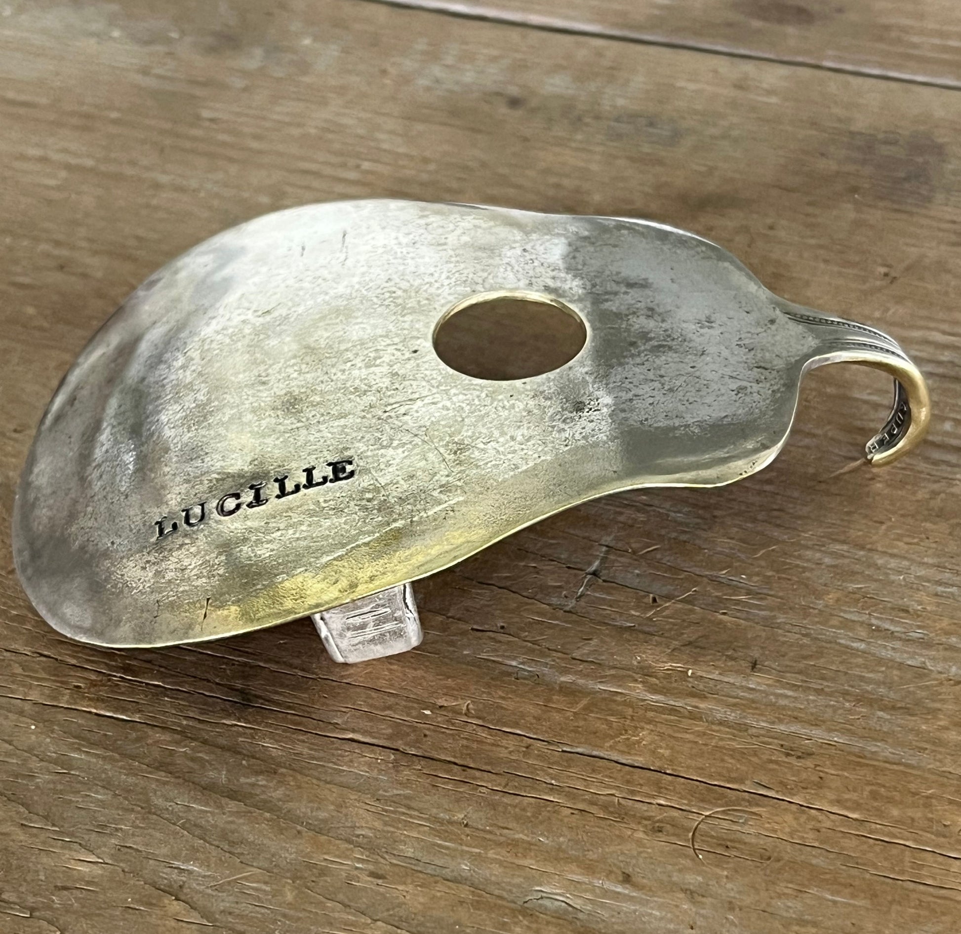 Lucille guitar spoon belt buckle, side view of construction shape - handcrafted from upcycled vintage silverware - Laughing Frog Studio