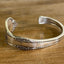 BADASS hand-stamped Affection cuff bracelet detailed view - handcrafted from upcycled 1960 Community Silverplate vintage silverware - Laughing Frog Studio