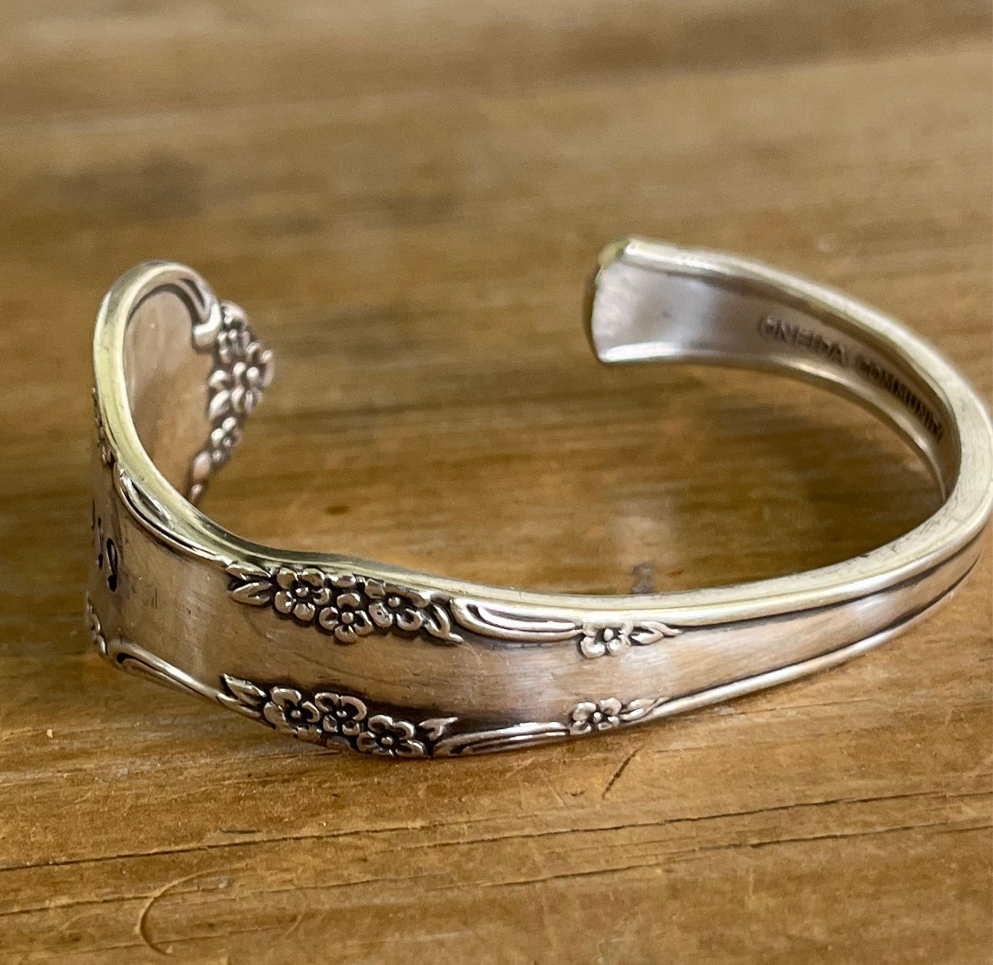 BADASS hand-stamped Affection cuff bracelet detailed view - handcrafted from upcycled 1960 Community Silverplate vintage silverware - Laughing Frog Studio