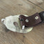 Guitar-shaped belt buckle handcrafted from upcycled vintage silverplate casserole spoon shown on a snap belt mechanism - one-of-a-kind wearable art for music lovers - Laughing Frog Studio