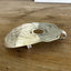 Side view of guitar-shaped belt buckle handcrafted from upcycled vintage silverplate casserole spoon - one-of-a-kind wearable art for music lovers - Laughing Frog Studio