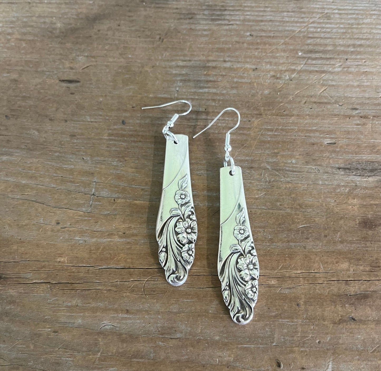 Floral Oneida Evening Star teardrop spoon earrings flay lay - handcrafted from upcycled vintage silverware - Laughing Frog Studio