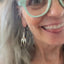 Spoon earring from mismatched spoon and fork earrings worn on model - handcrafted upcycled silverware jewelry for foodies - Laughing Frog Studio