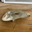 Side view of guitar spoon belt buckle showing sculptural shape - upcycled vintage silverware accessory - Laughing Frog Studio