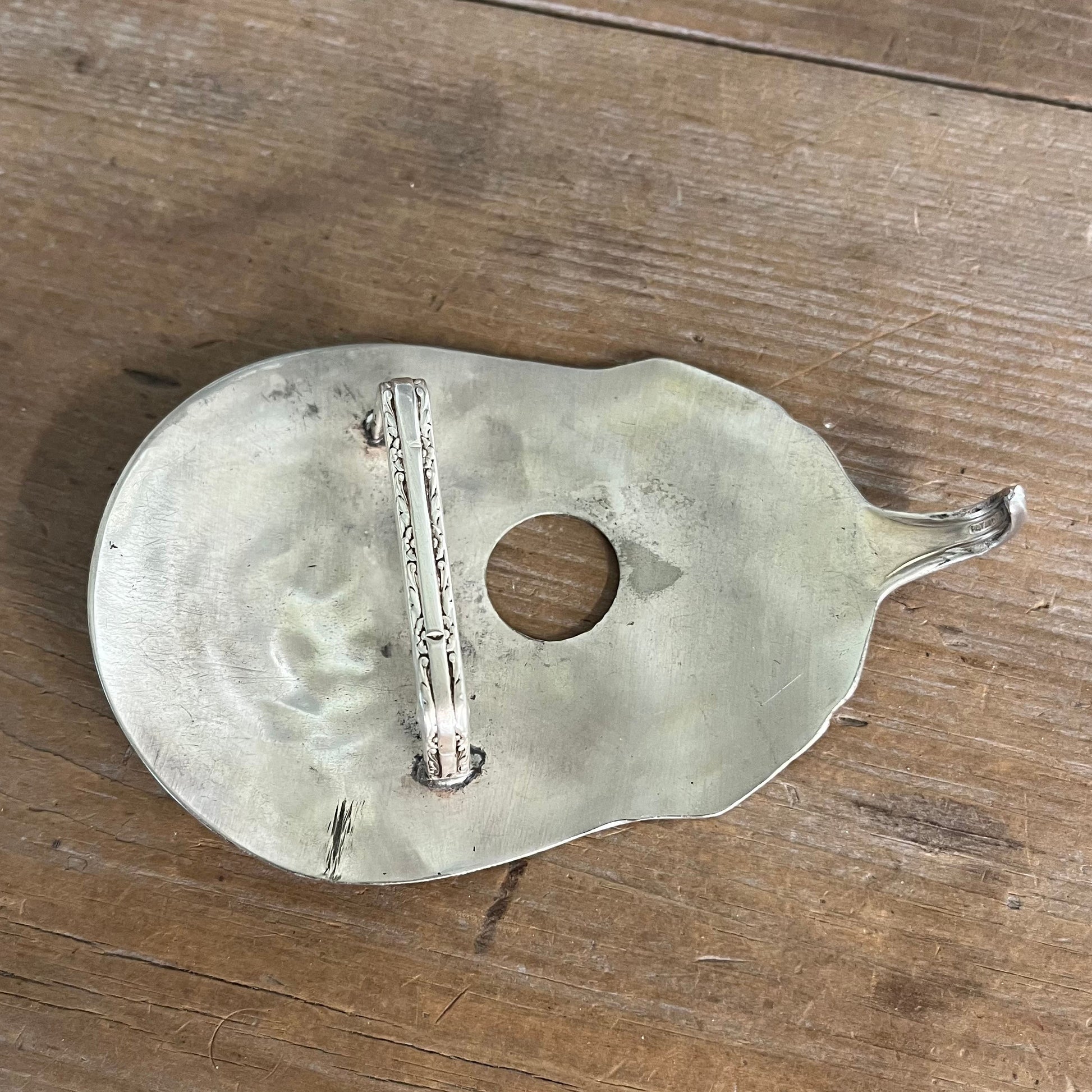 Back of guitar spoon belt buckle showing upcycled iced tea spoon neck catch - handcrafted eco-friendly silverware accessory - Laughing Frog Studio