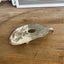 Alternate side view of guitar spoon belt buckle showing sculptural shape - upcycled vintage silverware accessory - Laughing Frog Studio