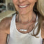 VOTE COMMUNITY bar pendant necklace worn on model - hand-stamped upcycled vintage silverware jewelry - Laughing Frog Studio


