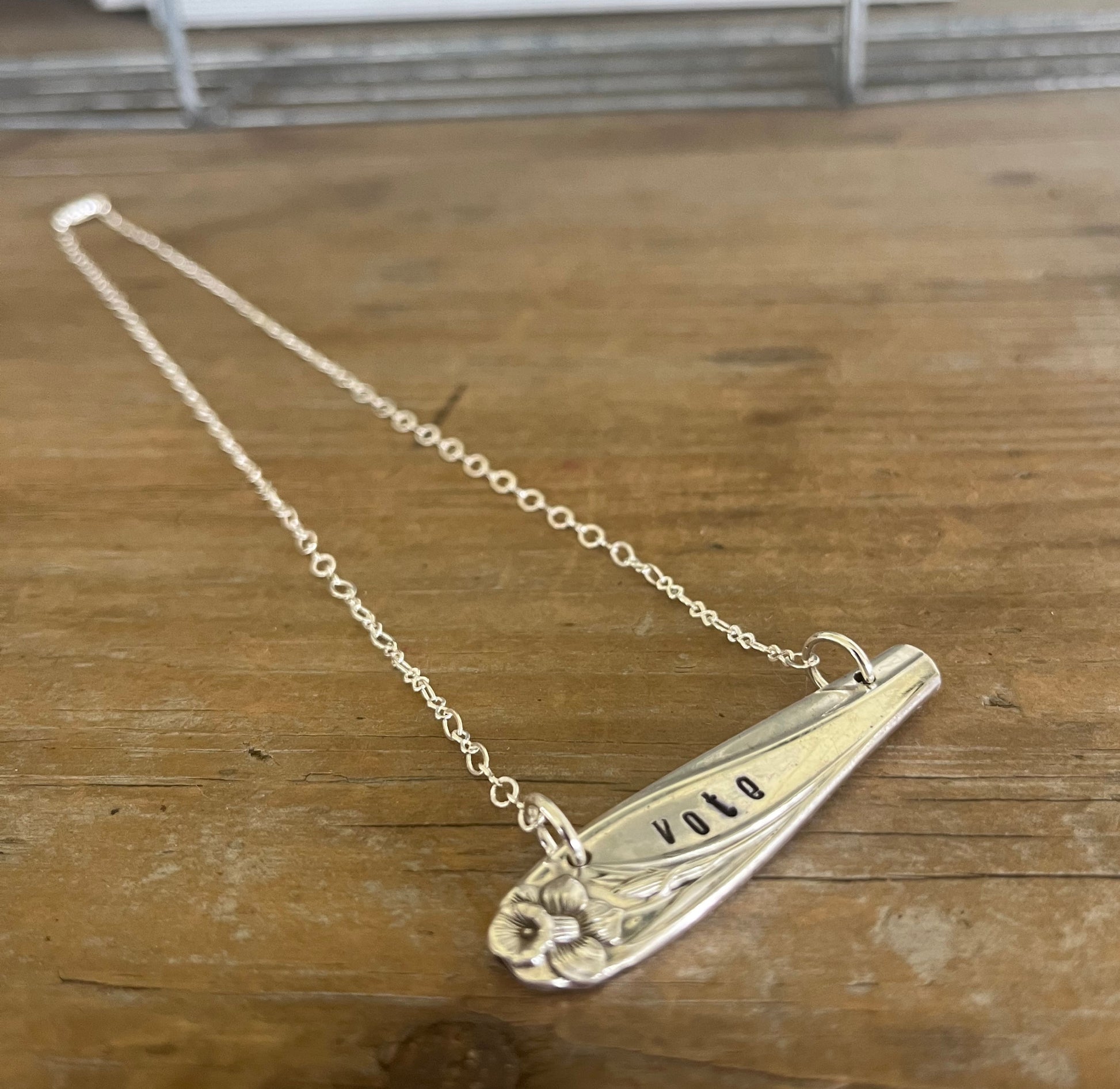 VOTE bar choker necklace full flat lay view - handcrafted from upcycled vintage Rogers Bros. Daffodil silverware - Laughing Frog Studio
