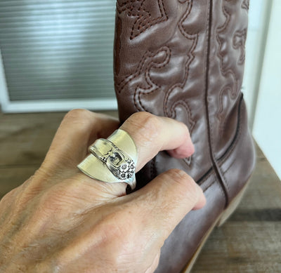 Spoon cuff ring ETERNALLY YOURS worn with brown cowboy boot showing bold statement style - handcrafted from upcycled vintage silverware - Laughing Frog Studio
