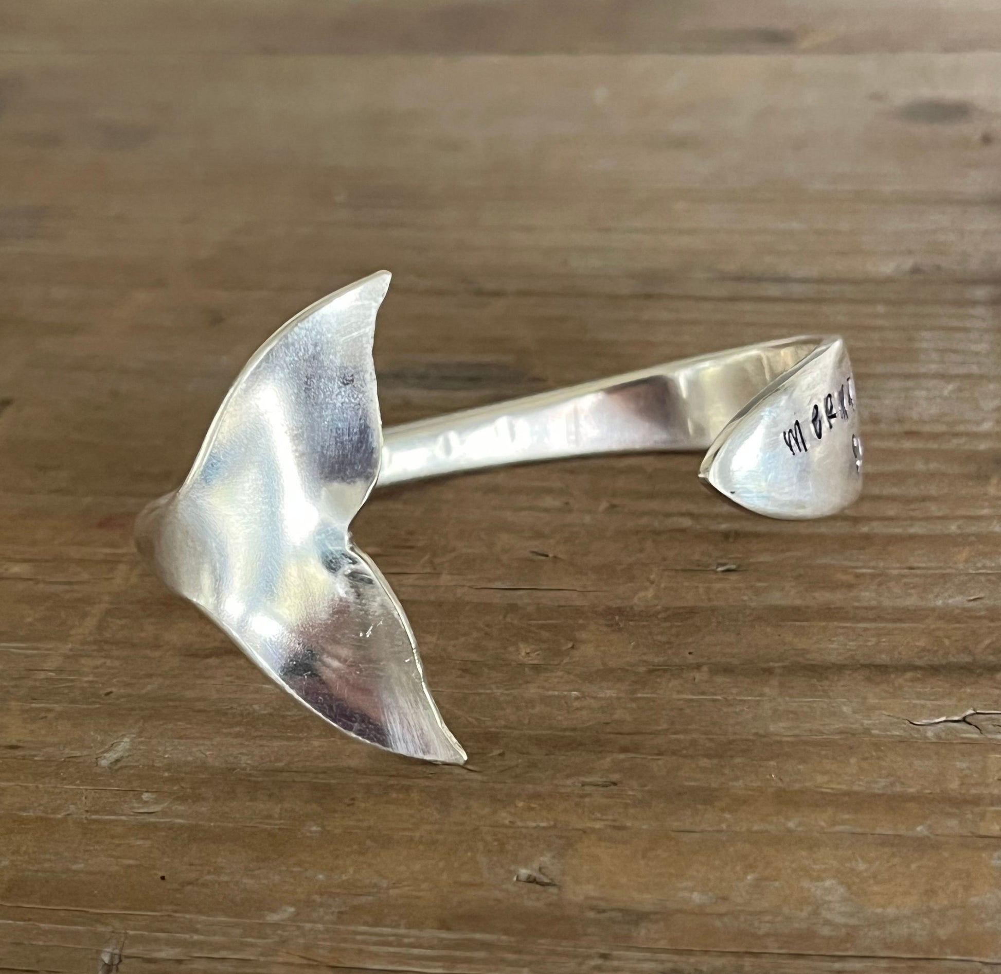 Back view of Mermaid Soul spoon cuff bracelet showing carved mermaid tail fin detail - handcrafted from upcycled vintage silverware - Laughing Frog Studio