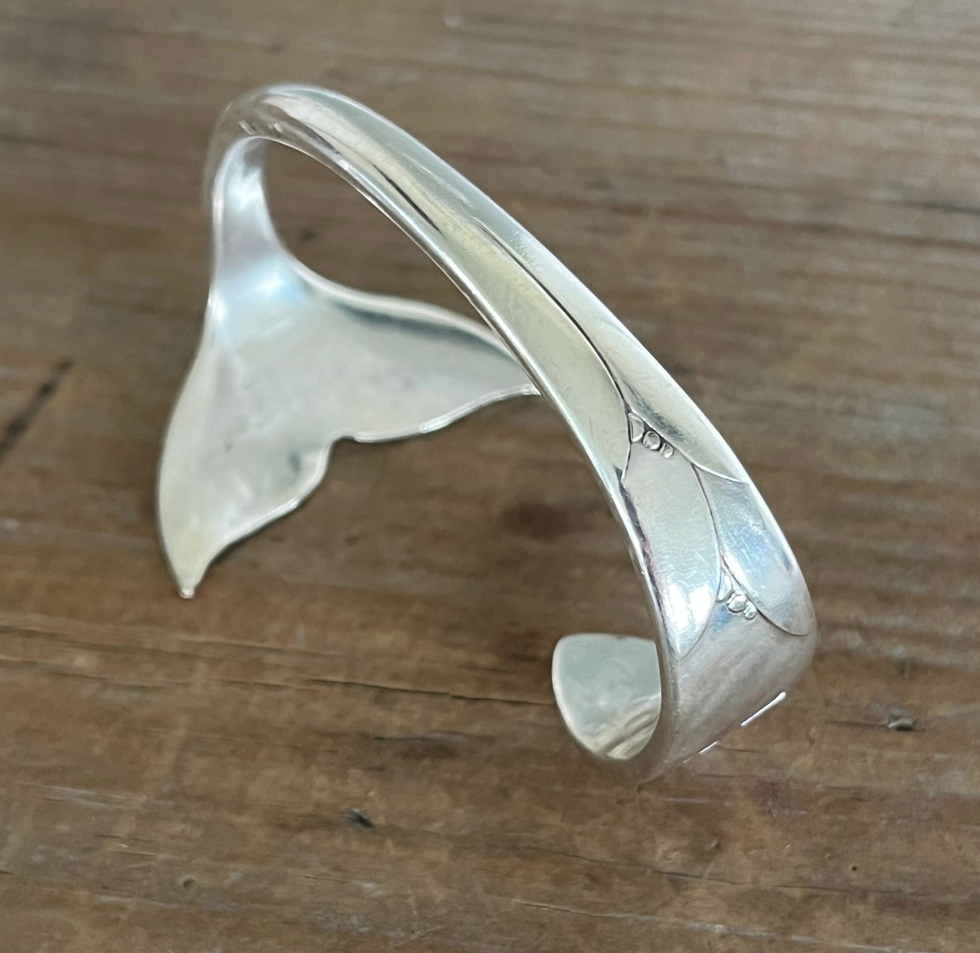 Top side view of Mermaid Soul spoon cuff bracelet showing Lady Hamilton silverplate pattern on cuff band - handcrafted from upcycled vintage silverware - Laughing Frog Studio
