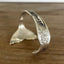 Side view of Mermaid Soul spoon cuff bracelet showing hand-stamped band and Signature pattern rose engraving with carved mermaid tail fin - handcrafted from upcycled vintage silverware - Laughing Frog Studio