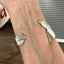 Mermaid Soul spoon cuff bracelet worn on wrist showing stamped Signature pattern spoon bowl and mermaid tail fin - handcrafted from upcycled vintage silverware - Laughing Frog Studio