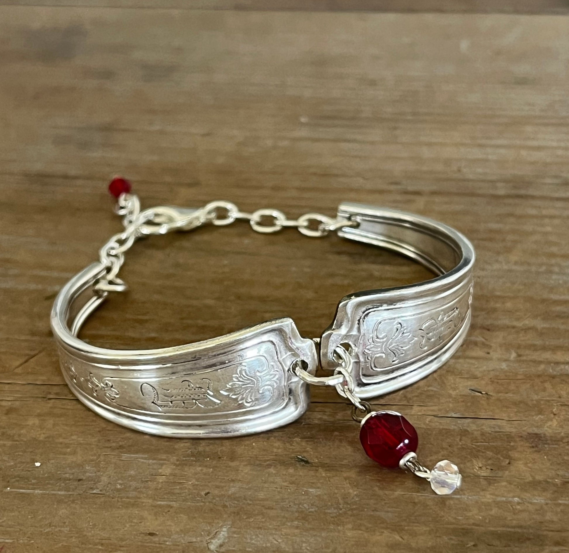 Louvain silverplate spoon link bracelet with engraved scrollwork and vintage red rosary bead detail - handcrafted from upcycled vintage silverware - Laughing Frog Studio