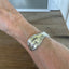 Worn on wrist side view - Mermaid Soul Precious Mirror pattern spoon cuff bracelet - handcrafted from upcycled vintage silverware - Laughing Frog Studio