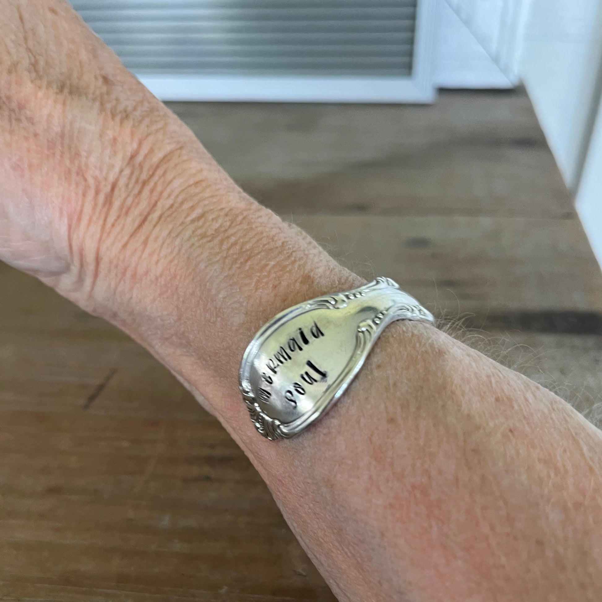 Worn on wrist side view - Mermaid Soul Precious Mirror pattern spoon cuff bracelet - handcrafted from upcycled vintage silverware - Laughing Frog Studio