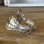 Close-up of mermaid tail fin and hand-stamped detail - Mermaid Soul Troy pattern spoon cuff bracelet - handcrafted from upcycled vintage silverware - Laughing Frog Studio