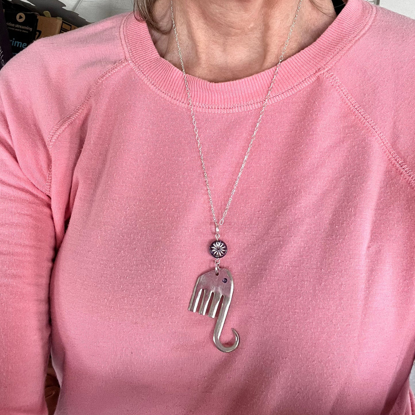 Fork elephant necklace with purple glass bead worn on model - upcycled vintage silverplate pendant necklace - handcrafted from upcycled vintage silverware - Laughing Frog Studio
