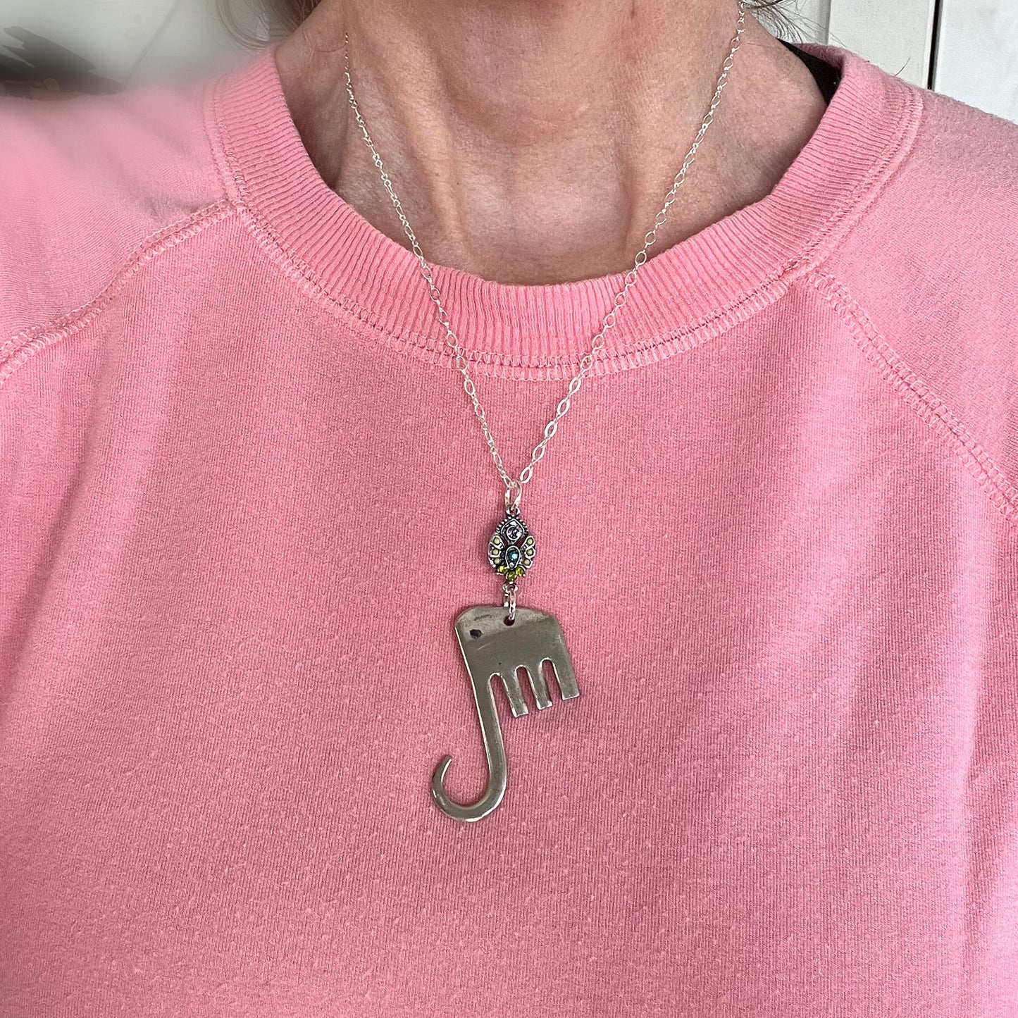 Fork elephant necklace with rhinestone charm worn on model - upcycled vintage silverplate pendant necklace - handcrafted from upcycled vintage silverware - Laughing Frog Studio